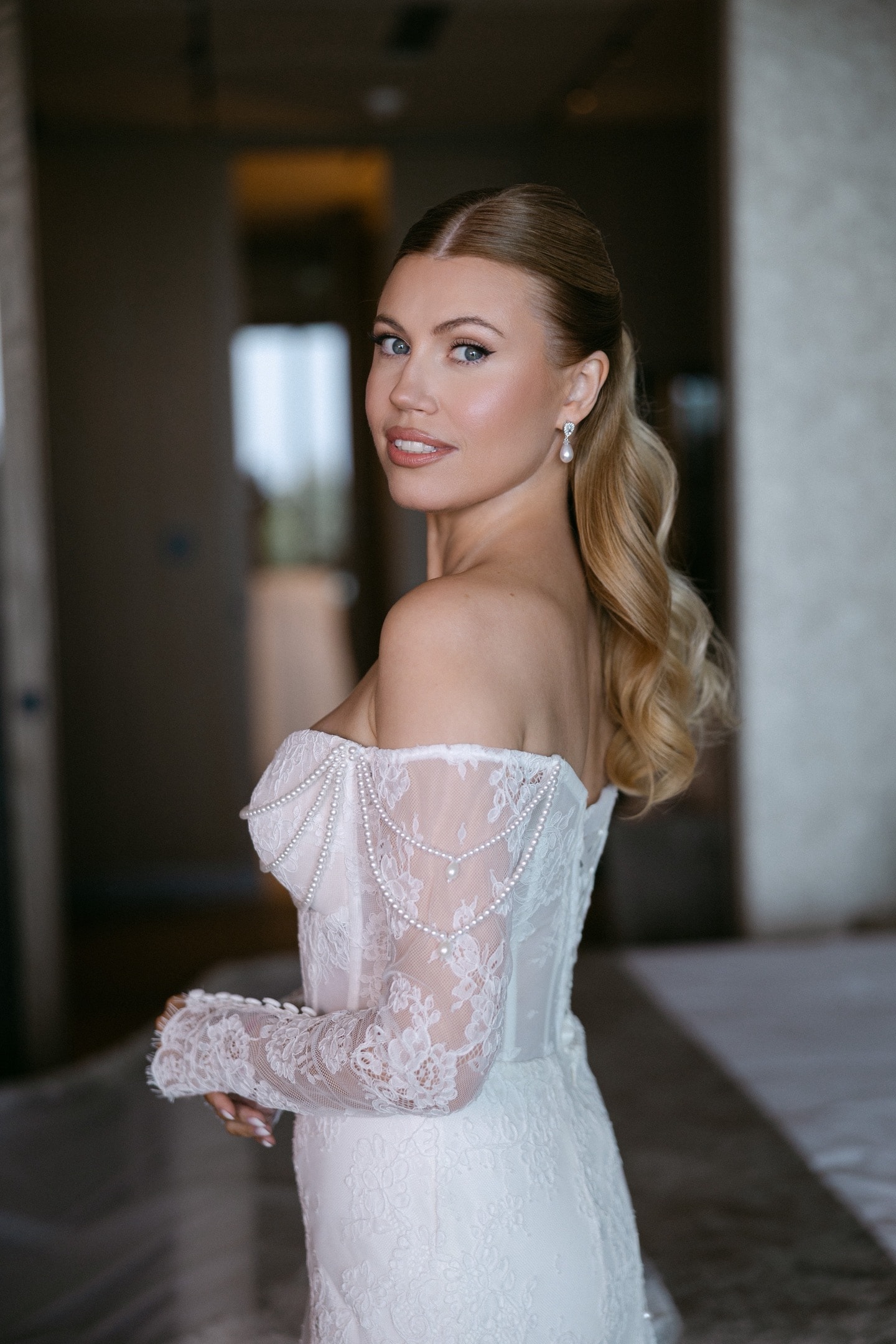Bride in a lace off-shoulder gown